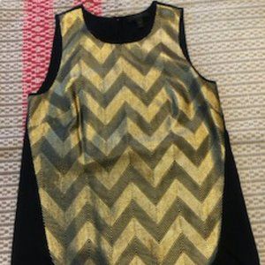 Sleeveless gold and navy chevron top